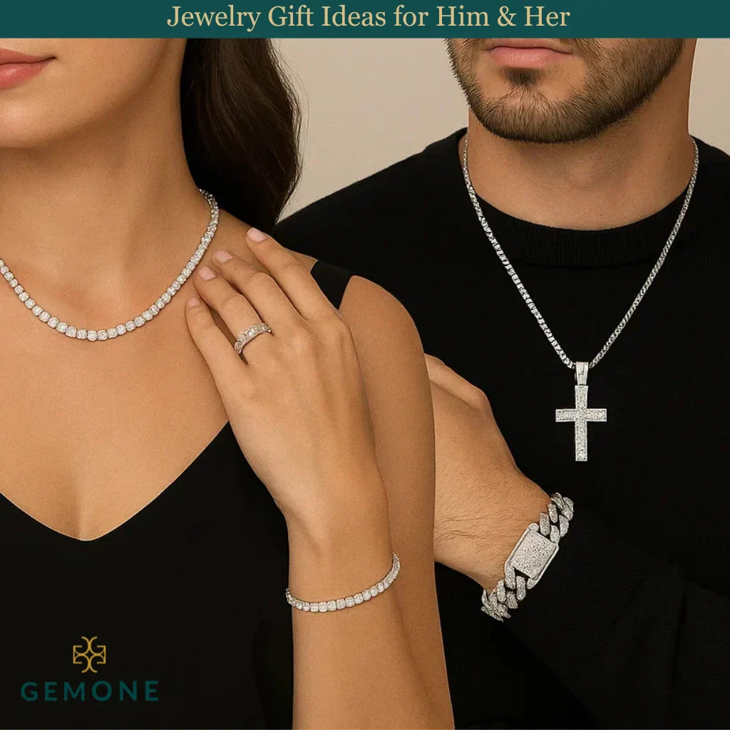 A couple wearing diamond jewelry. The woman showcases a diamond necklace, bracelet, and ring, while the man wears a diamond cross pendant necklace and bracelet.