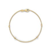 0.07 Carat Bezel Set Diamond Station Bracelet in Yellow Gold
