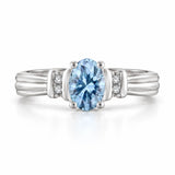 0.69 Carat Oval Cut Blue Diamond Ring