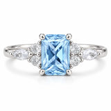 1.34 Carat Radiant Cut Diamond Ring with Marquise and Round Diamonds
