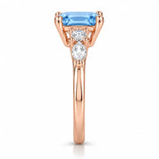Side view of 1.34 Carat Radiant Cut Diamond Ring with Marquise and Round Diamonds