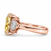 Side View Of 1.82 Carat Fancy Yellow Cushion Cut Three Stone Diamond Ring