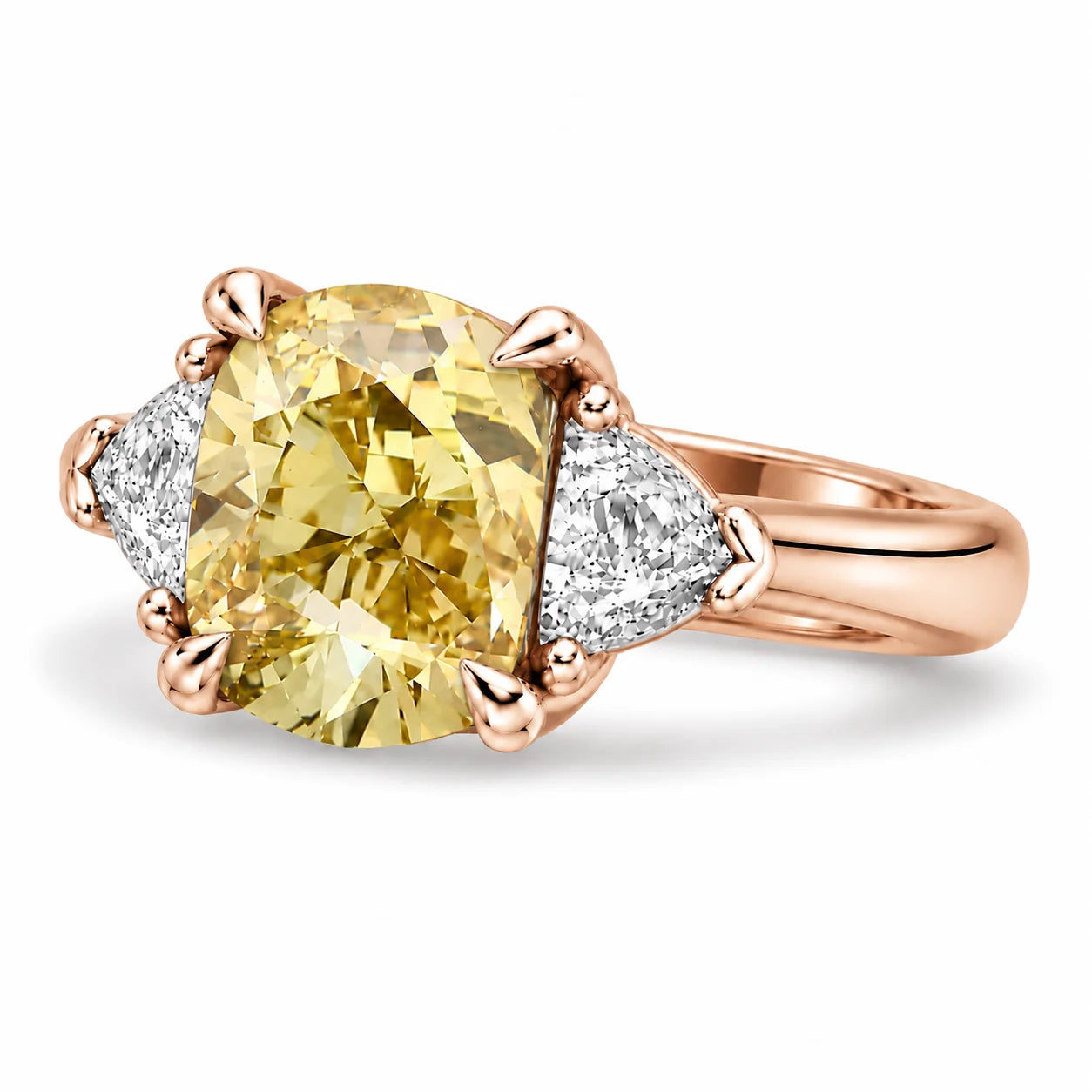 Angled View Of 1.82 Carat Fancy Yellow Cushion Cut Three Stone Diamond Ring