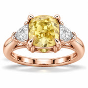 Front View Of 1.82 Carat Fancy Yellow Cushion Cut Three Stone Diamond Ring