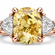 Close up View Of 1.82 Carat Fancy Yellow Cushion Cut Three Stone Diamond Ring