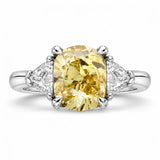 1.82 Carat Fancy Yellow Cushion Cut Three Stone Diamond Ring