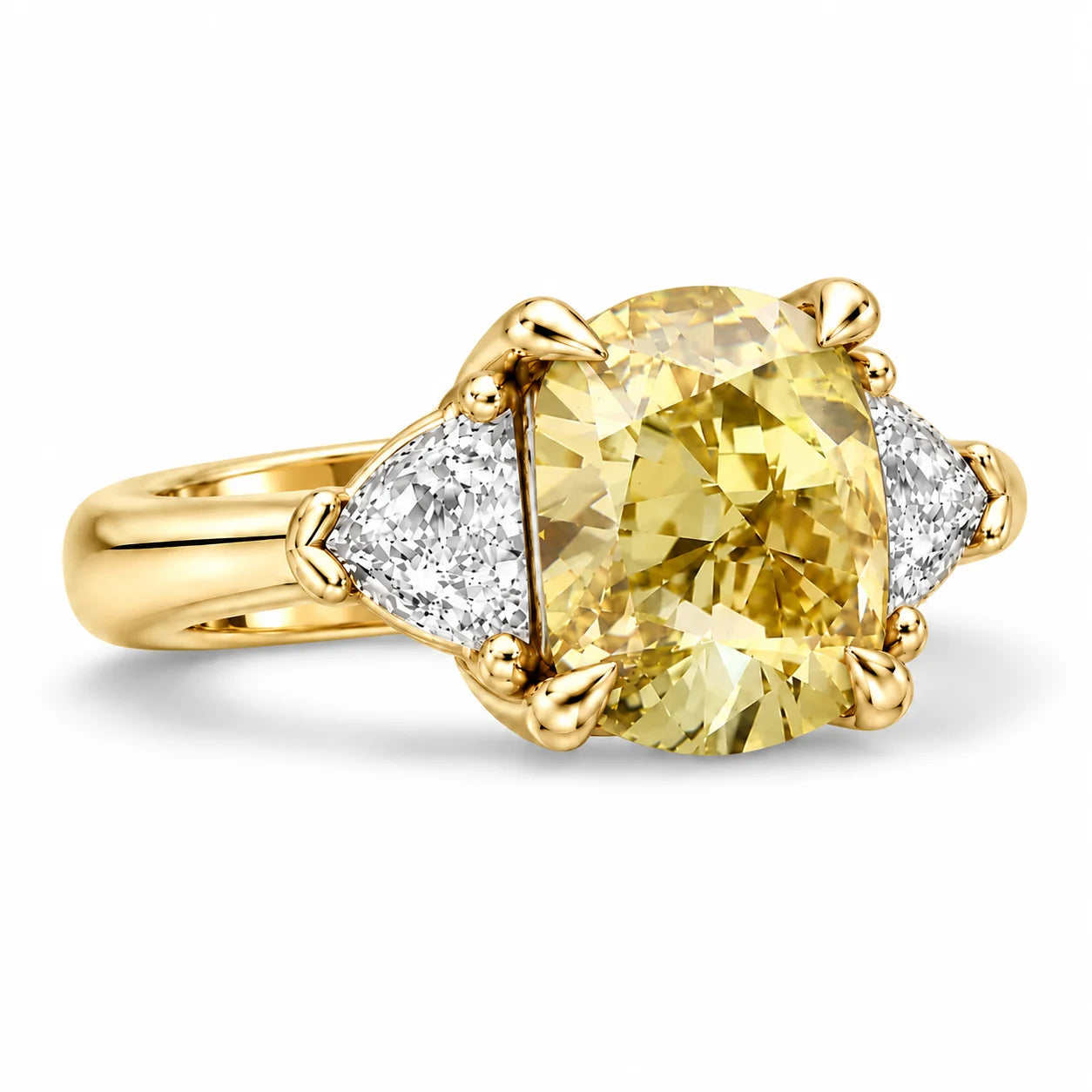 Angled View Of 1.82 Carat Fancy Yellow Cushion Cut Three Stone Diamond Ring