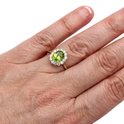 4.28 Carat Oval Shape Halo Peridot Gemstone Ring