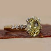 3.45ct Oval Fancy Yellow Diamond Ring with Accents