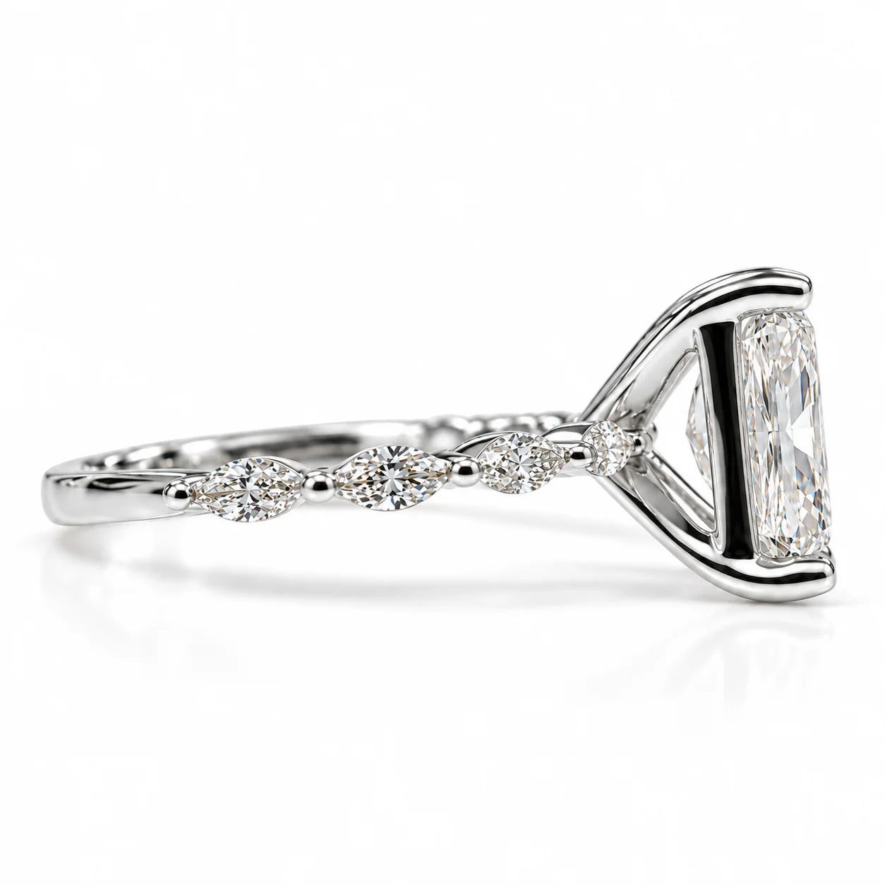 Side view of 2.50 Ct Radiant cut diamond ring with marquise side stones