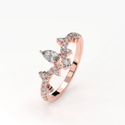 Angled View Of 0.56 carat Pear Cut Tiara Style Diamond Promise Ring 